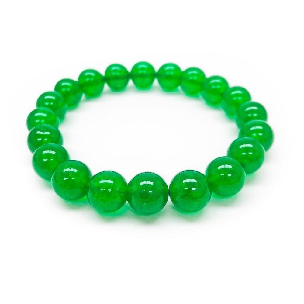 Asian Carved Green Jade Beaded Bracelet: This beautifully crafted Asian Green Jade Beaded Bracelet holds 20 lusterous Jade beads, and is a staple in Chinese jewelry as their culture values the artwork and craftsmanship of Jade pieces. See ph
