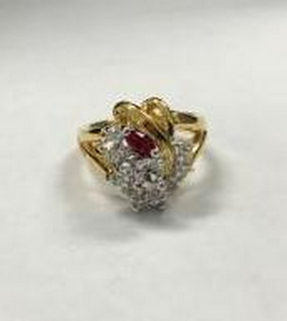 Cluster Ring in Gold Electroplate: Cluster Ring in Gold Electroplate Make a bold yet elegant statement with this stunning gold electroplated ring, featuring a beautiful cluster of sparkling white gemstones accented by a single