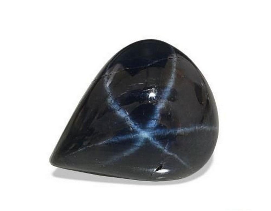 3.94 ct Natural Deep Navy Blue Star Sapphire, Pear Cabochon, Opaque, Thailand: 3.94 ct Natural Deep Navy Blue Star Sapphire, Pear Cabochon, Opaque, Thailand Natural star sapphire weighing 3.94 carats, cut in a pear-shaped cabochon with a deep navy blue color. The gemstone