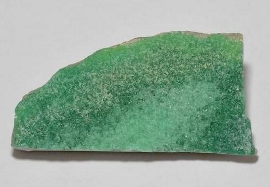 Medium Green Druzy Variscite Fancy Crystal Cluster: Medium Green Druzy Variscite Fancy Crystal Cluster This eye-catching Druzy Variscite crystal cluster features a fresh medium green hue and a sparkling surface of fine crystals. The fancy, freeform sh