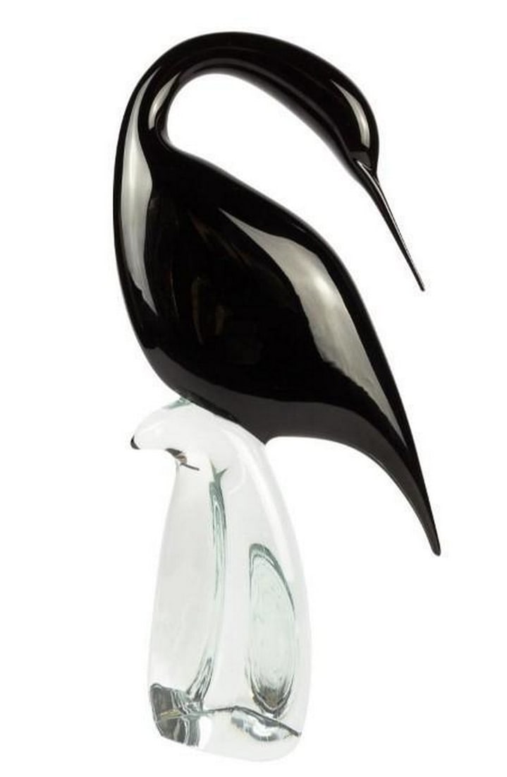 Murano Glass Black Female Heron: Murano Glass Black Female Heron Graceful and poised, this Black Heron Female sculpture is a stunning example of Murano glass artistry. Handcrafted in Italy, the sculpture features sleek black glass w