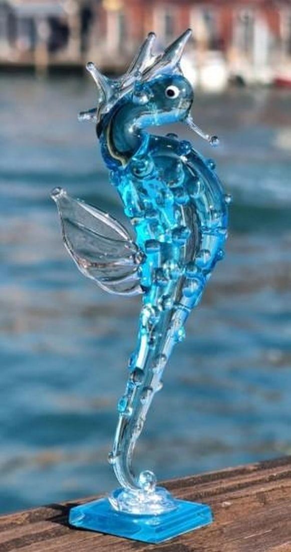 Ocean Grace Murano Seahorse Sculpture: Ocean Grace Murano Seahorse Sculpture Delicate and enchanting, this Murano glass seahorse figurine captures the graceful charm of the sea. Handcrafted with flowing curves and luminous color, it
