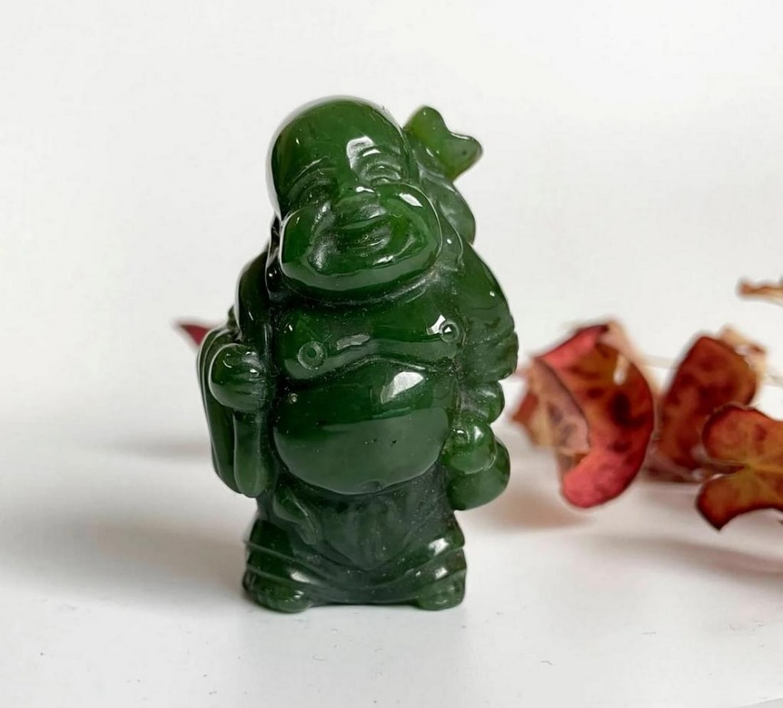 Traveling Buddha – Canadian Nephrite Jade, High Polish: Traveling Buddha – Canadian Nephrite Jade, High Polish Hand-carved Traveling Buddha made from Canadian nephrite jade with a smooth high polish finish. This piece embodies serenity and movement, with