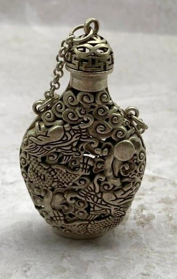 Dragon's Breath Snuff Bottle: A Silver Pendant of Power (1 of 5)