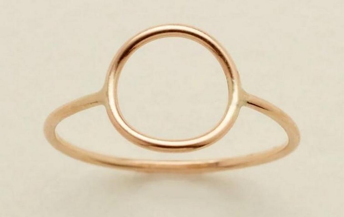 Equinox Circle Ring - Size 6: Equinox Circle Ring - Size 6 Embody the perfect blend of minimalism and meaning with the Equinox Ring. A sleek, stackable band that adds subtle dimension to any look, it serves as a reminder that the