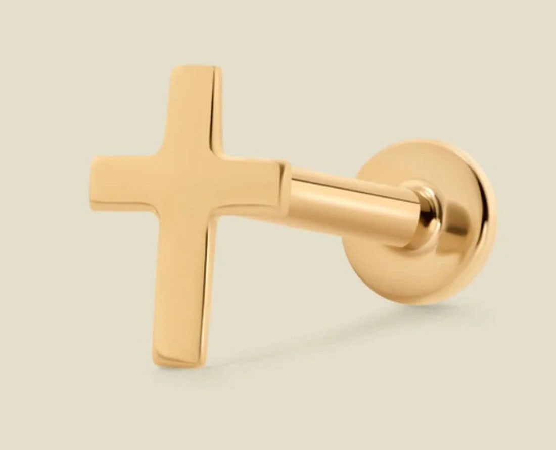14k Solid Gold Cross Stud Earrings: 14k Solid Gold Cross Stud Earrings This delicately designed cross is a beautiful symbol of the faith you carry. Each petite, solid gold earring features a smooth, flat back that inserts through