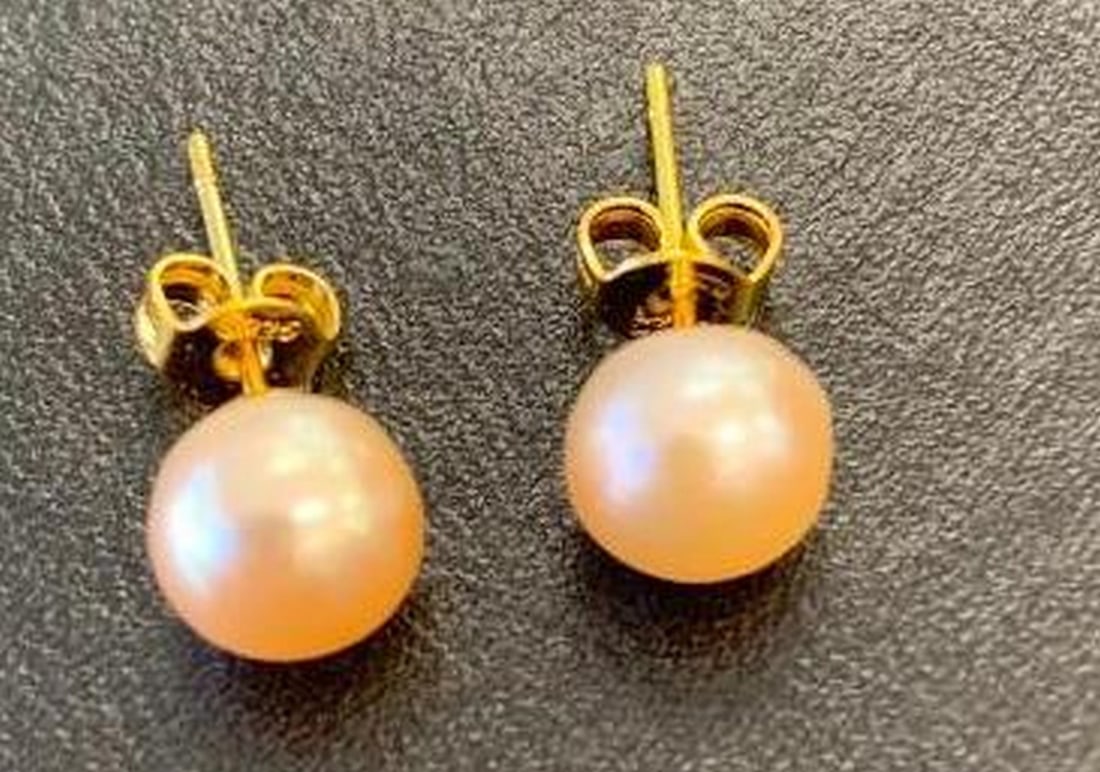 Pearl Stud Earrings: Pearl Stud Earrings These beautiful stud earrings feature radiant pearls set on gold-plated sterling silver posts for a refined, feminine look. Their minimalist design makes them a versatile