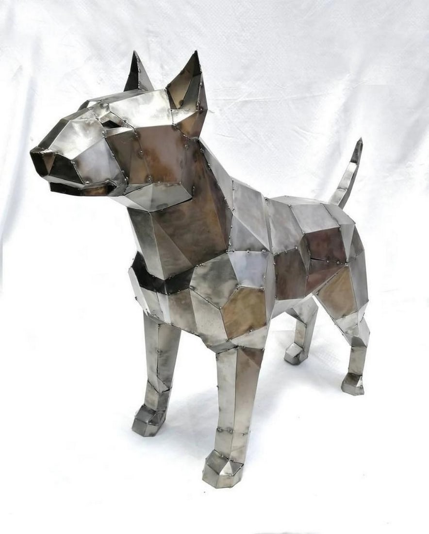 Life-Size Metal Bull Terrier Sculpture: Life-Size Metal Bull Terrier Sculpture This handcrafted metal sculpture captures the strength and character of the English Bull Terrier in a striking life-size design. Sculpted and welded with precisi