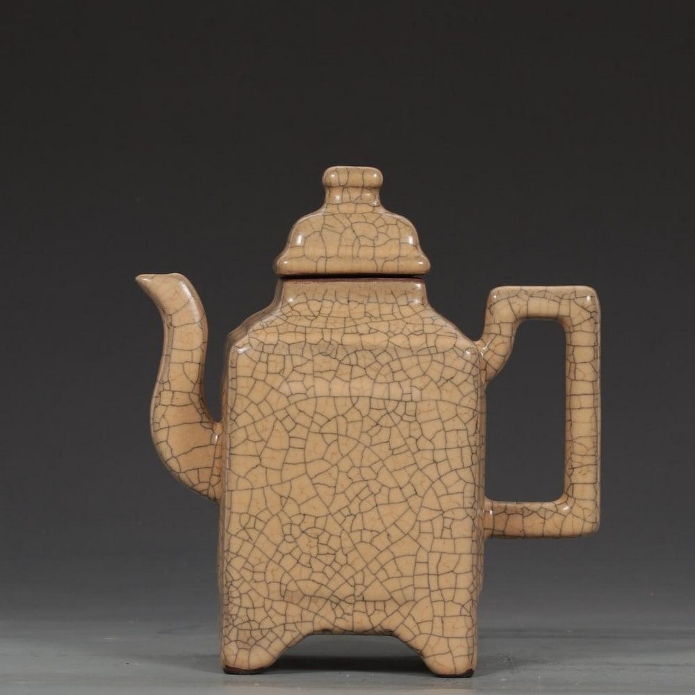 Beige-Glazed Pot: Beige-Glazed Pot A ceramic pot inspired by the Southern Song Dynasty known for its elegant forms and distinctive glazes. This vessel is coated in a warm beige glaze with a subtle crackle pattern, ch
