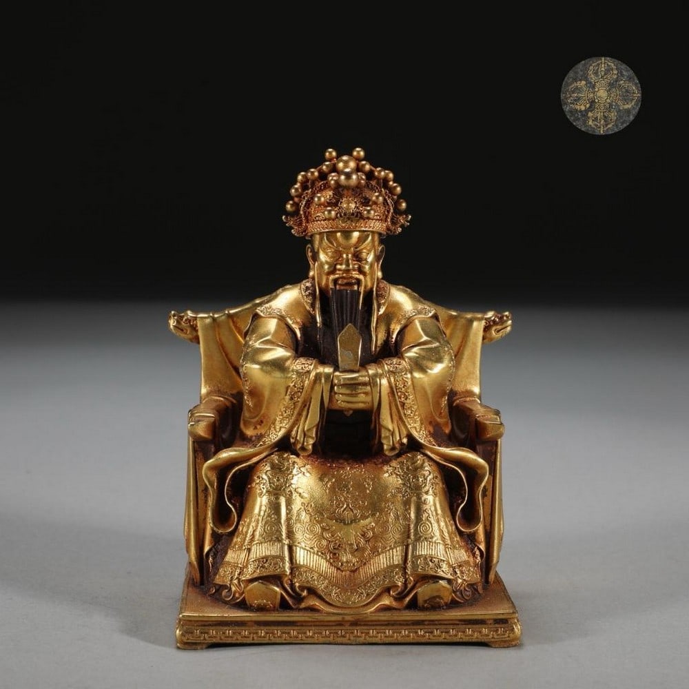 Bronze Dragon Master Sitting Statue: Bronze Dragon Master Sitting Statue This remarkable gilt bronze statue inspired by Ming Dynasty features the Dragon Master seated in a commanding yet composed posture, embodying mystical authority