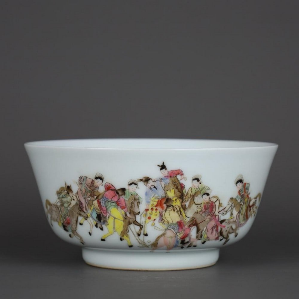 Famille Rose Equestrian Bowl with Dynamic Riders: Famille Rose Equestrian Bowl with Dynamic Riders A vibrant famille rose porcelain bowl inspired by the Qing Dynasty, bearing the Yongzheng reign mark, depicting a lively equestrian scene. The exterio