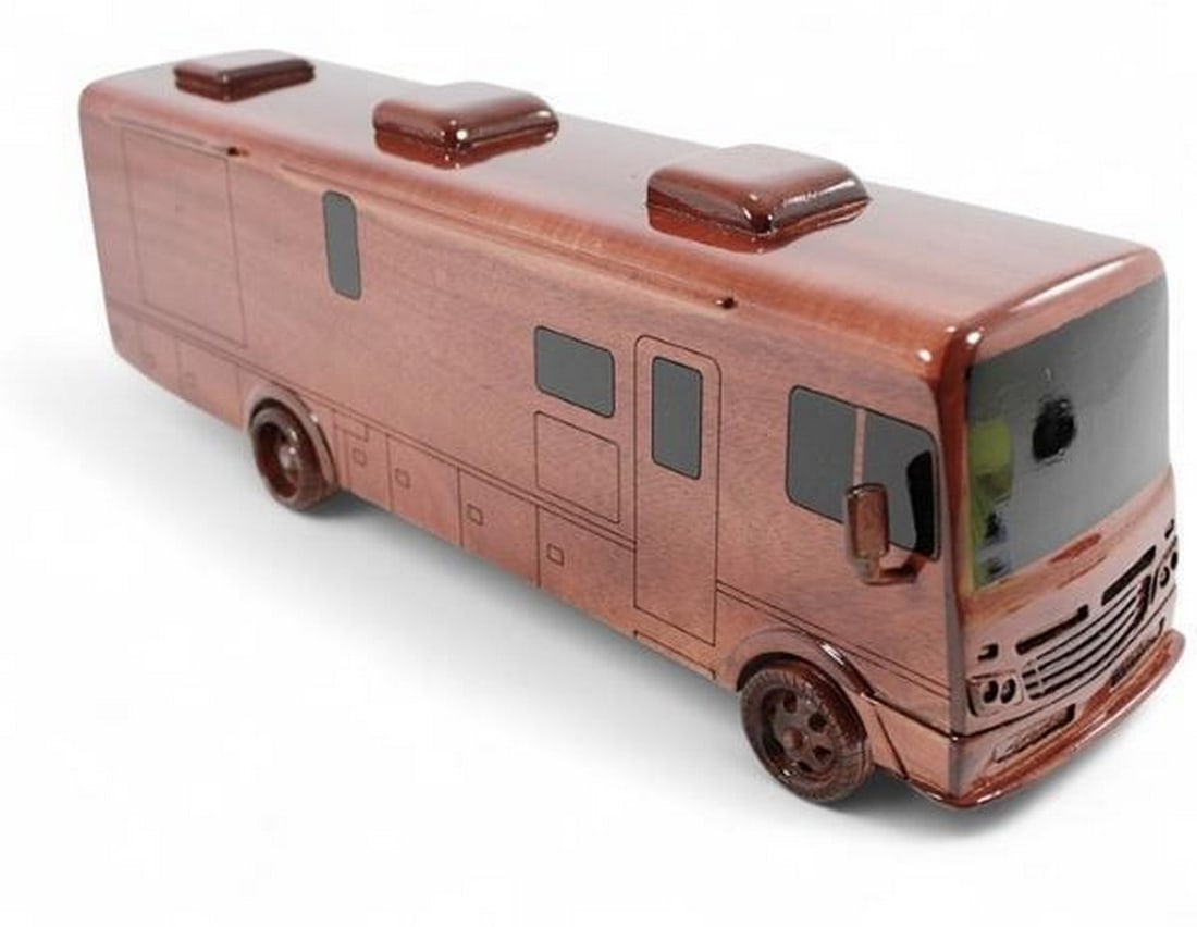 RV Motorhome Wood Model: RV Motorhome Wood Model This gorgeous Class A Motorhome is handcrafted with detail and beautiful mahogany wood. Dimensions: 14.5"L x 3.5"W x 5"H View Photos For Further Details.