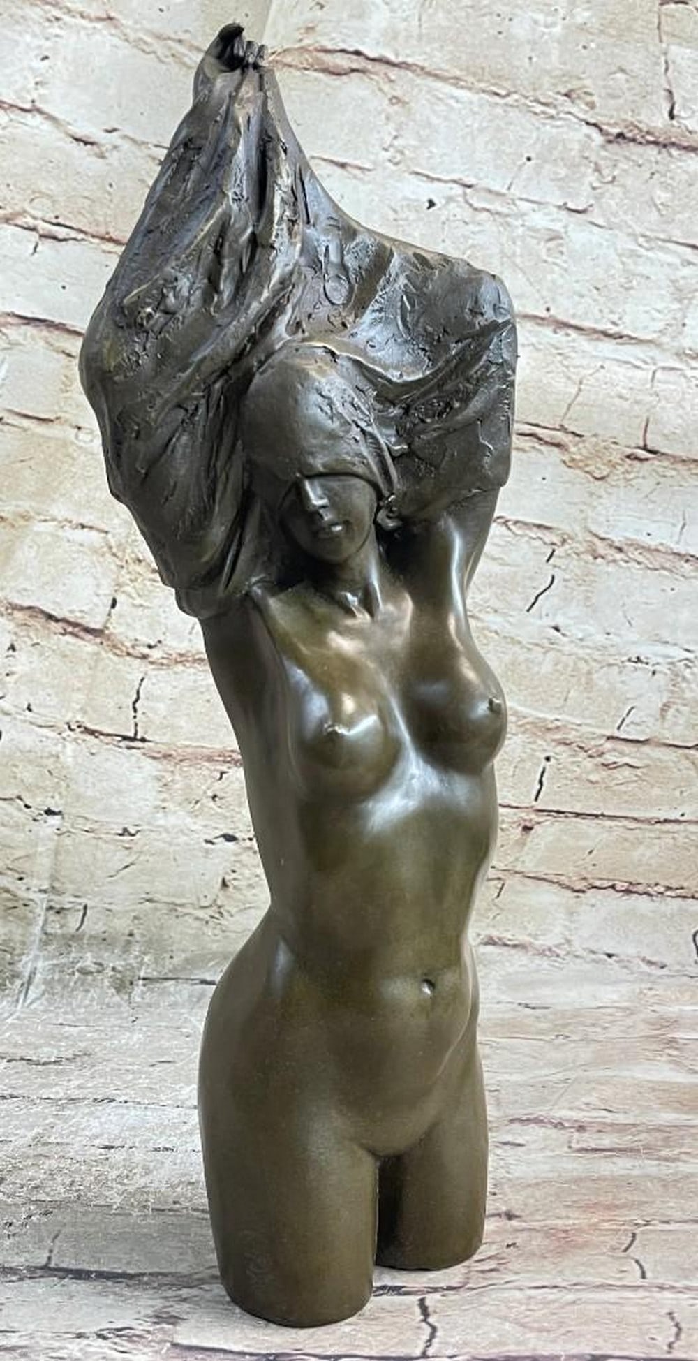 Nude Female Torso Bronze Sculpture: Nude Female Torso Bronze Sculpture She is a rock muse. Rebellious, free, independent, sultry and full of confidence. This rocker groupie, poses for a photo. With reckless abandon, she rip
