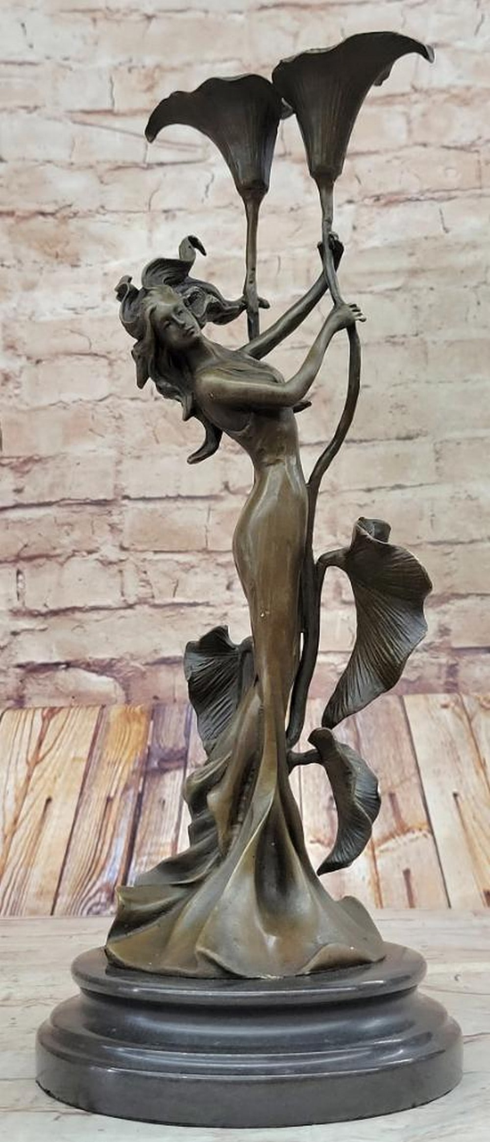 Tulip Young Girl Candlestick Bronze Sculpture by Milo – 15" x 6": Tulip Young Girl Candlestick Bronze Sculpture by Milo – 15" x 6" This Art Deco bronze sculpture, titled "Tulip Young Girl Candlestick," depicts a young girl gracefully holding a tuli