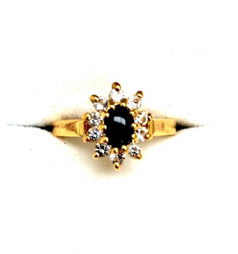 Size 7 Oval Cut Onyx Gemstone In 18KTGP Yellow Gold Electroplate Finish Ring: Size 7 Oval Cut Onyx Gemstone In 18KTGP Yellow Gold Electroplate Finish Ring. Nickel Allergy Free, Base Metal- Brass, 18KTGP Yellow Gold Electroplate Finish. Rings Have 120 Mils 18kt Gold Finish, Sign