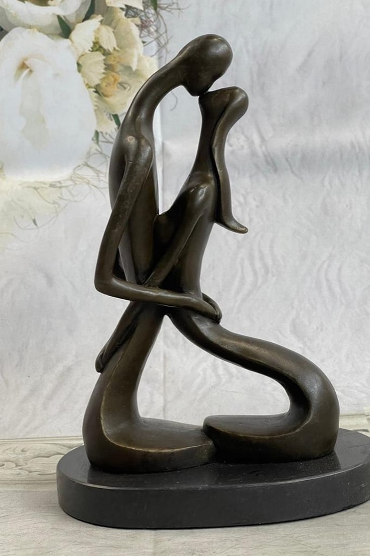 Two Lovebirds Sharing a Moment Bronze Sculpture: Two Lovebirds Sharing a Moment Bronze Sculpture An abstract sculpture of two lovebirds sharing an intimate kiss. Their arms are wrapped around each other. In this wonderful representation