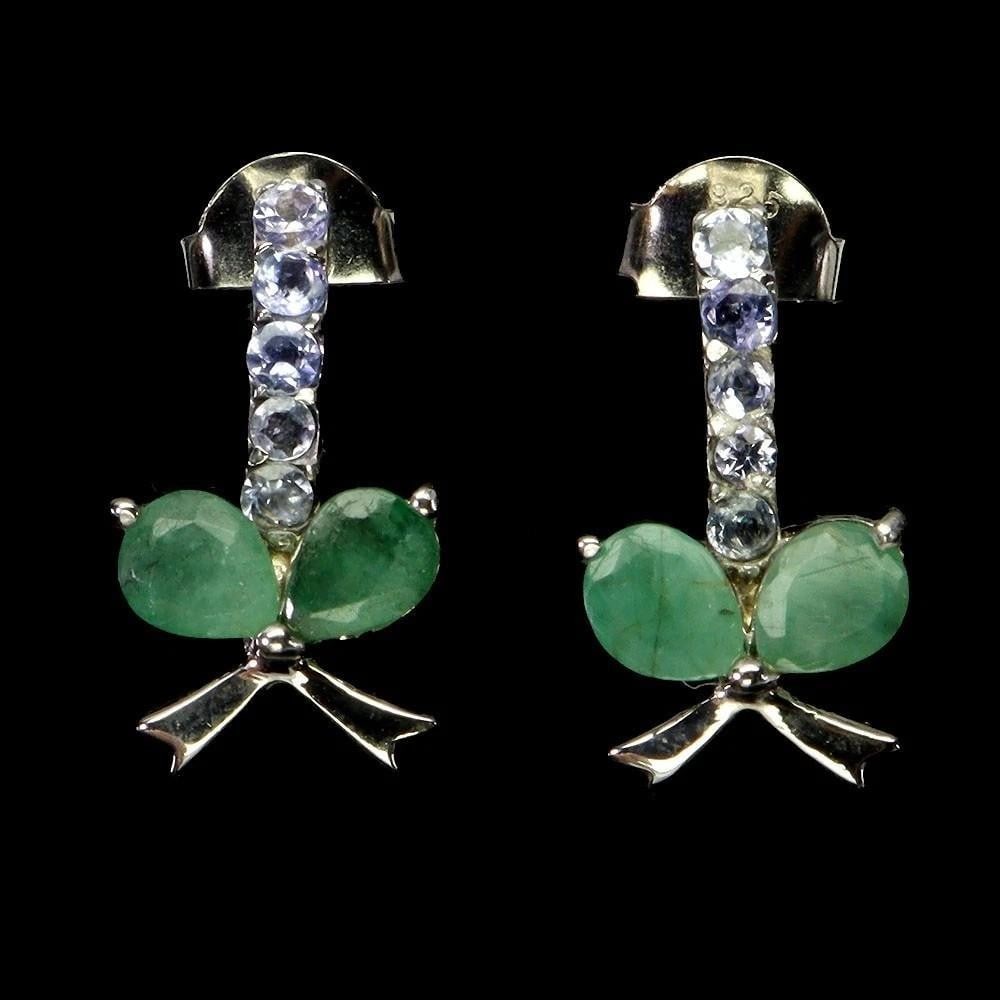 925 Sterling Silver Earrings with Pear Emerald and Tanzanite: 925 Sterling Silver Earrings with Pear Emerald and Tanzanite These earrings feature a 5 × 4 mm pear-cut natural emerald accented with tanzanite gemstones, set in 925 sterling silver plated with 14k w