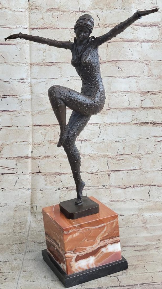 Graceful Balance Bronze Sculpture Inspired by D.H. Chiparus - 21" x 13": Graceful Balance Bronze Sculpture Inspired by D.H. Chiparus - 21" x 13" This elegant bronze sculpture captures a woman in a poised, balletic stance, balancing effortlessly on one leg with arms