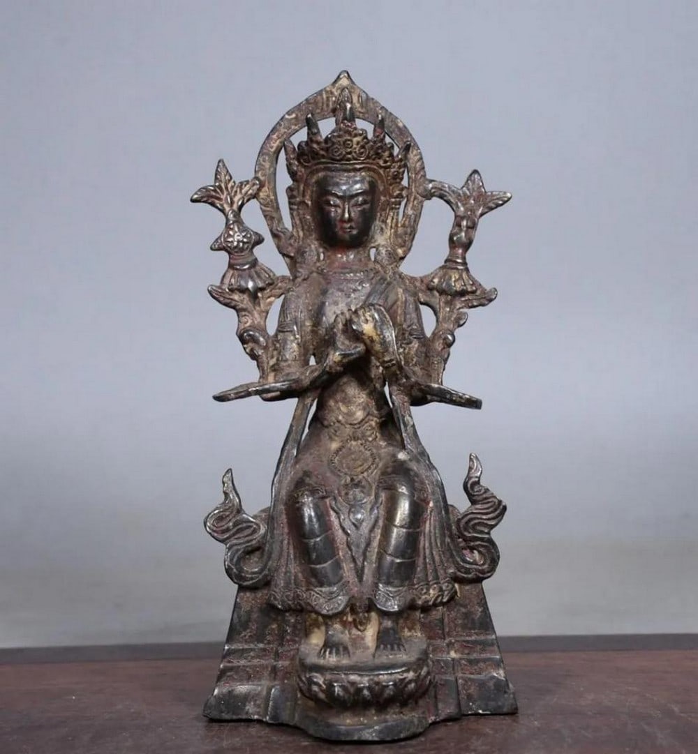 Gilded Copper Qiangba Buddha Statue: Gilded Copper Qiangba Buddha Statue This antique Qiangba Buddha statue is a rare and exquisite piece of traditional Chinese craftsmanship, meticulously handcrafted from pure copper and adorned