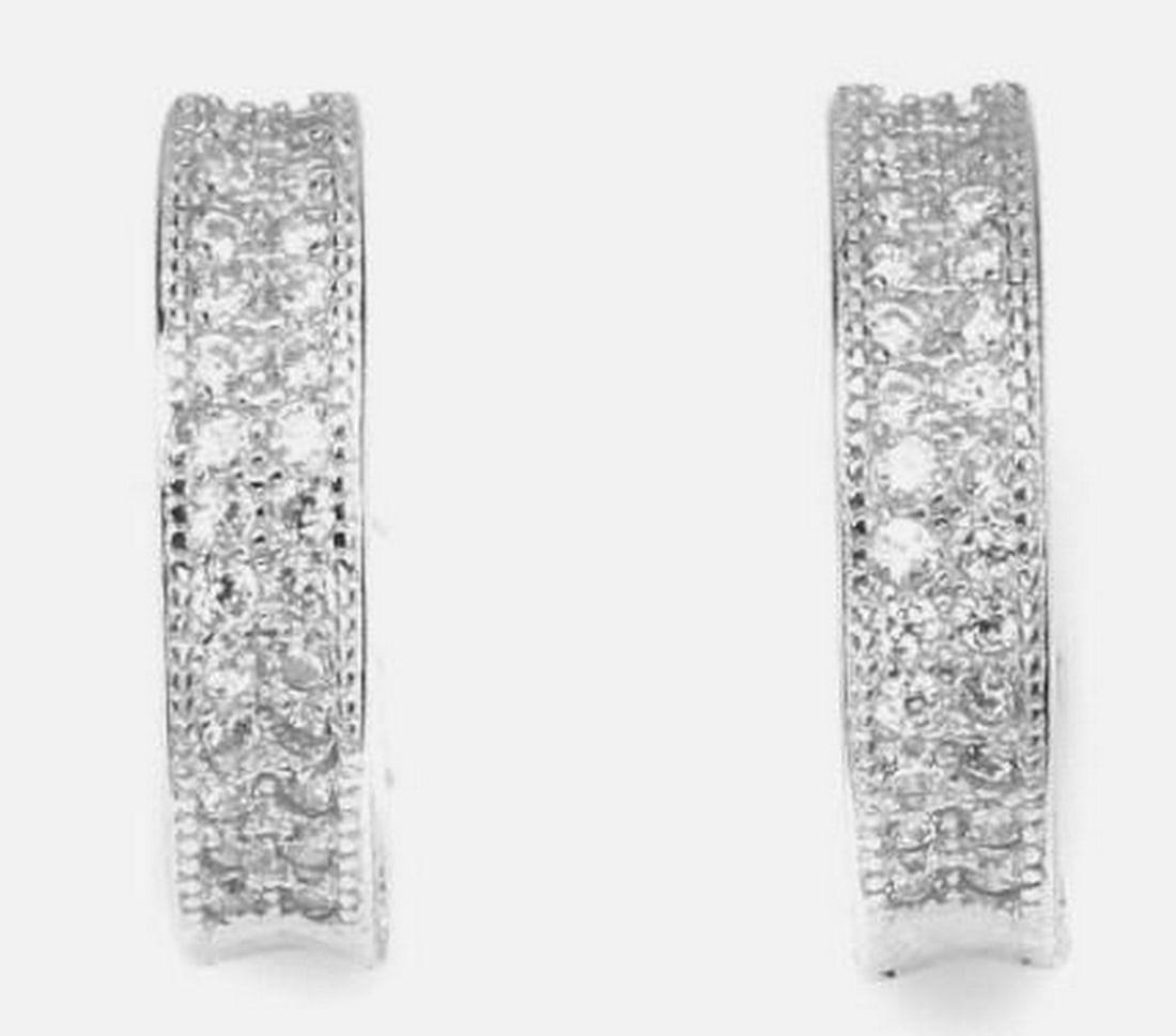 Radiant Round White CZ Sterling Silver Hoop Earrings: Radiant Round White CZ Sterling Silver Hoop Earrings Add a touch of timeless brilliance with these sterling silver earrings, featuring round white simulated CZ gemstones that shimmer with every