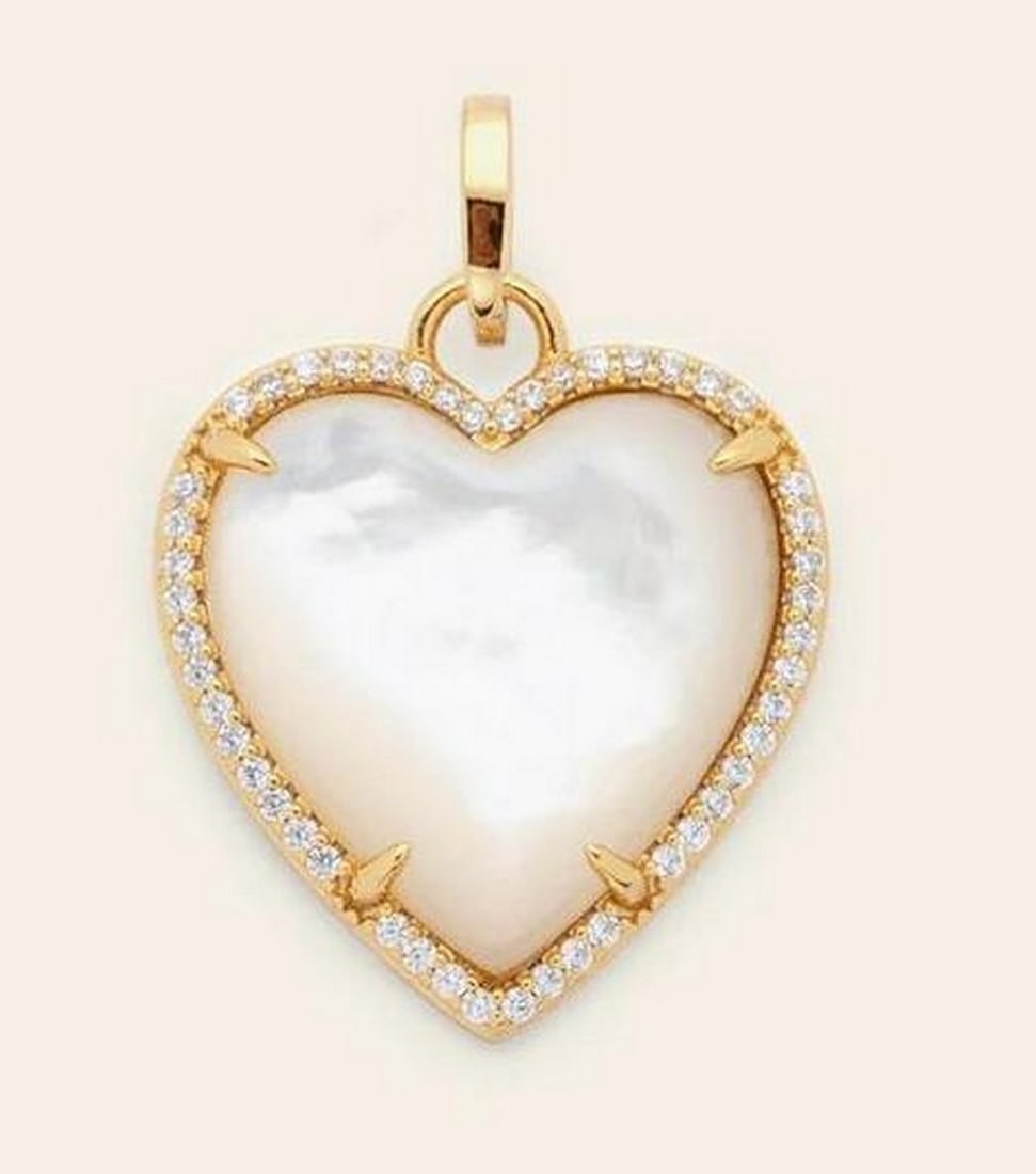 Luminous Heart Charm – Gold Vermeil/Mother of Pearl: Luminous Heart Charm – Gold Vermeil/Mother of Pearl Soft sheen with a timeless glow, the Luminous Heart Charm features mother of pearl for a naturally iridescent finish. Crafted in 14k gold vermeil
