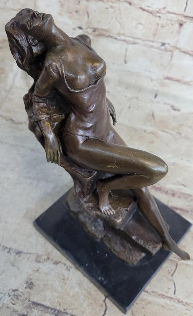 Signed Original Sensual Woman Bronze Sculpture - 9" x 10": Signed Original Sensual Woman Bronze Sculpture - 9" x 10" She is an artist's muse. She poses for a painting, sitting on the edge of a rock.She is wearing a negligee is draped over the sid