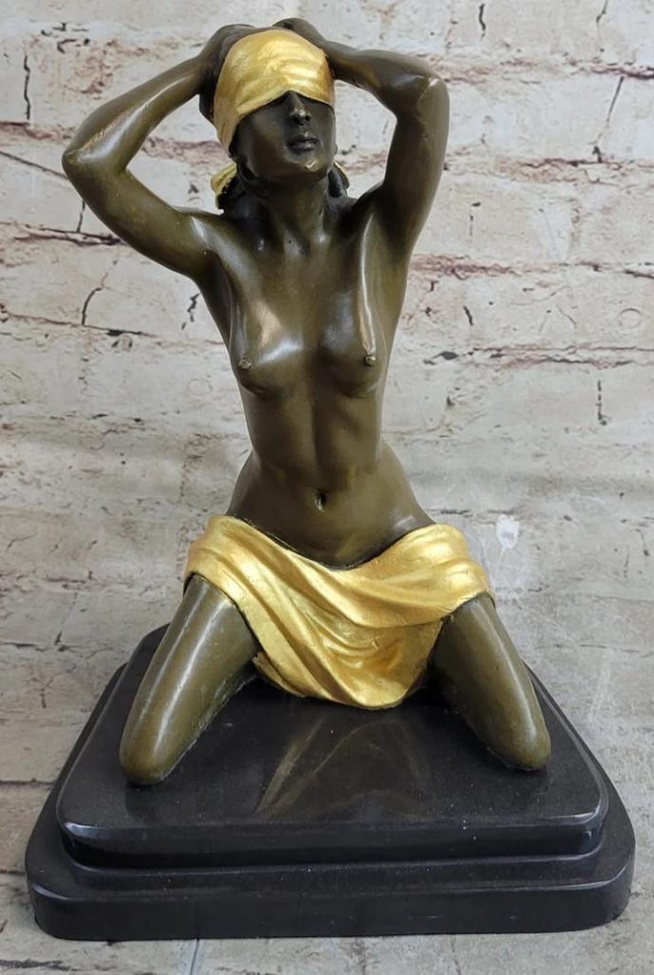 Blindfolded Female Erotic Nude Woman Bronze Sculpture - 12" x 9": Blindfolded Female Erotic Nude Woman Bronze Sculpture - 12" x 9" A nude, captive woman awaits her savior. She sits on her heels and slightly arches her back, bringing her hands up behind her