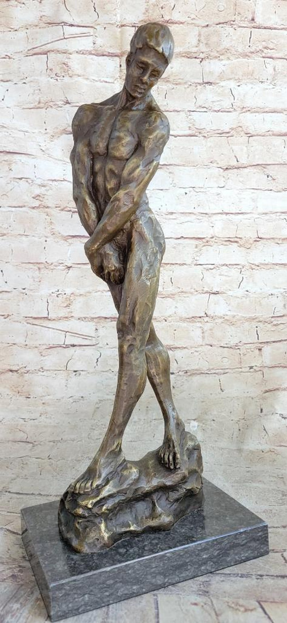Famous Rodin Inspired 'Adam' Bronze Sculpture - 19" x 8": Famous Rodin Inspired 'Adam' Bronze Sculpture - 19" x 8" There is a certain dejected vulnerability to the nude man as he walks swaying, his head downcast, as he covers himself with bo