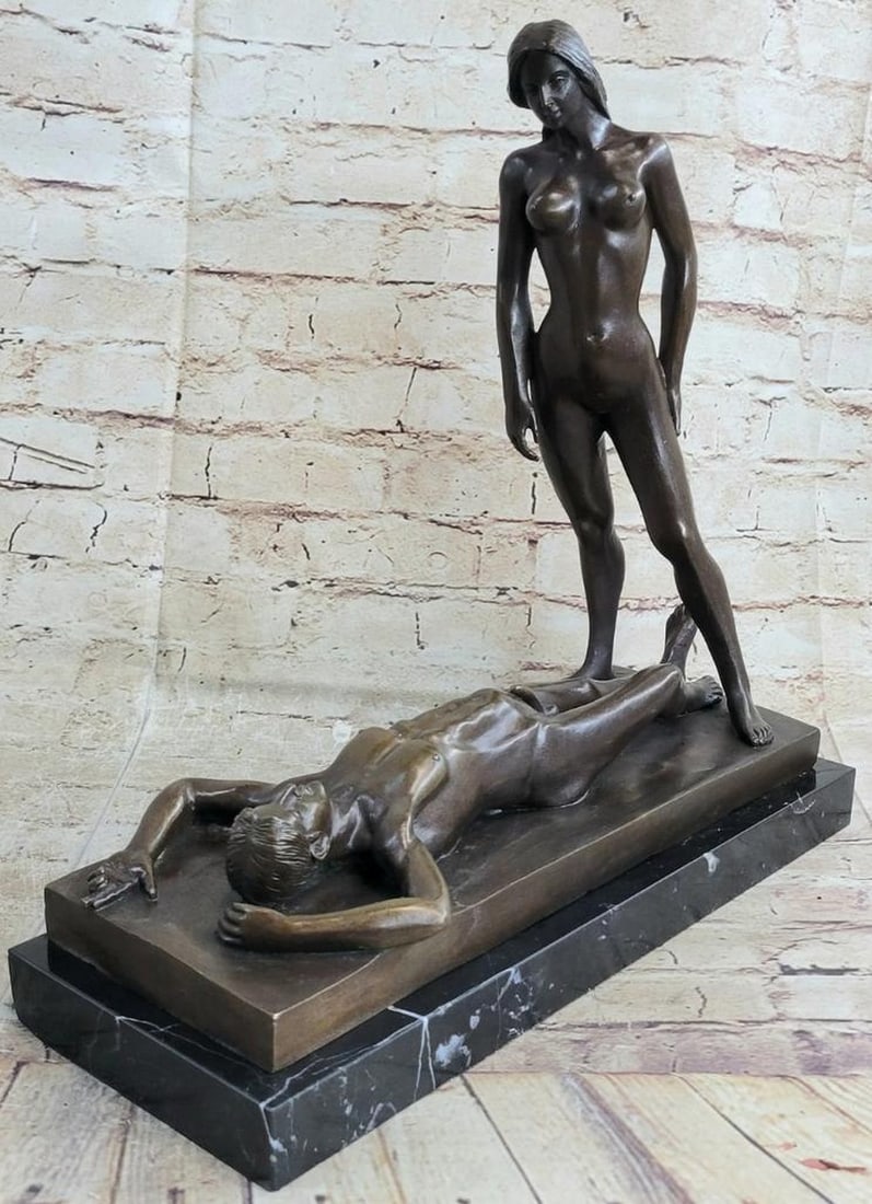 Bronze Sculpture by J. Mavchi Lovers' Passionate Connection - 15" x 15.5": Bronze Sculpture by J. Mavchi Lovers' Passionate Connection - 15" x 15.5" This stunning bronze sculpture by J. Mavchi captures the intimate connection between two lovers entwined in a mome