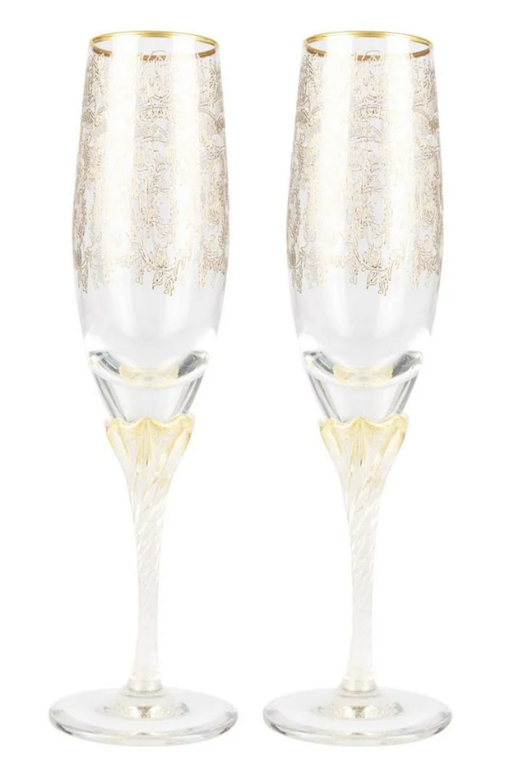 Barocco Crystal Champagne Flutes Set of Two - Gold Accents: Barocco Crystal Champagne Flutes Set of Two - Gold Accents These flutes feature intricate engravings created with a cold glass cut technique and are adorned with gold accents. Elevate your dining expe