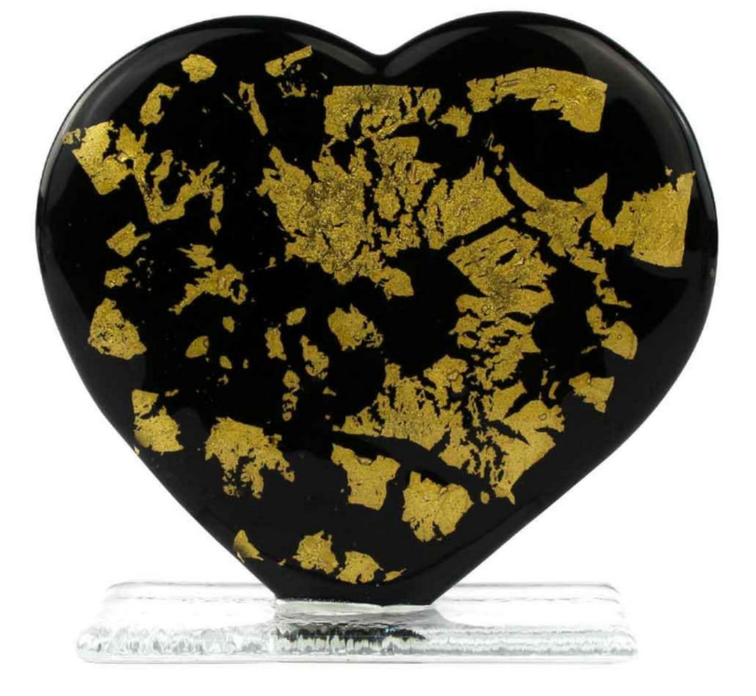 Black Heart of Gold – Murano Glass Love Sculpture: Black Heart of Gold – Murano Glass Love Sculpture This exclusive glass artwork is handcrafted using the fused glass technique, featuring a glass heart adorned with a smaller heart made from