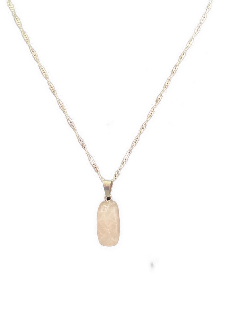 Surreal Rose Quartz and Sterling Silver Healing Amulet: Surreal Rose Quartz and Sterling Silver Healing Amulet Soft and elegant this is a handmade irregular natural Rose Quartz. Rose quartz is known as the crystal of unconditional love. It's said