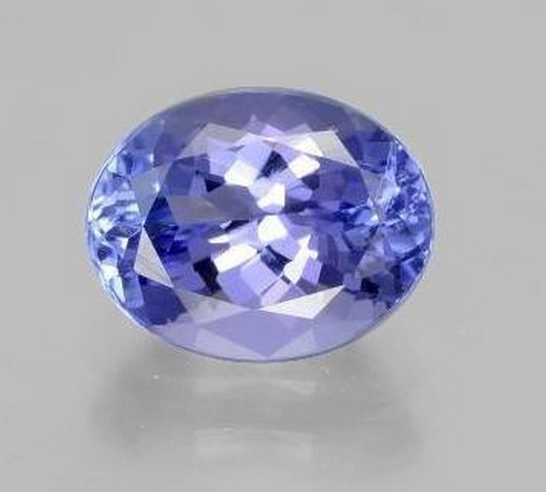 2.5 ct Oval Cut Faceted Deep Intense Violet Blue Tanzanite Gemstone: 2.5 ct Oval Cut Faceted Deep Intense Violet Blue Tanzanite Gemstone Introducing our Oval Cut Faceted Deep Intense Violet Blue Tanzanite Gemstone—a spellbinding fusion of elegance and enchanting