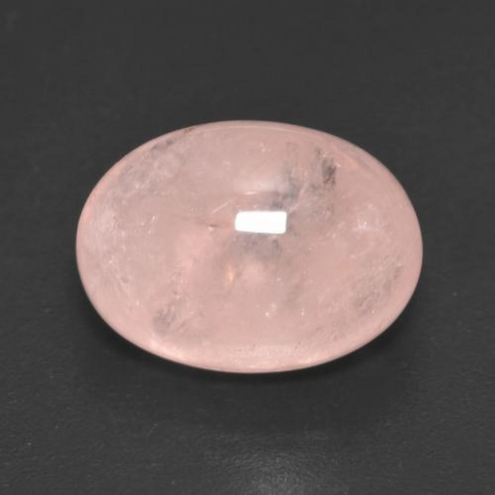 7.80 ct Oval Cut Rose Blush Morganite Gemstone: 7.80 ct Oval Cut Rose Blush Morganite Gemstone Introducing our "Rose Blush Morganite Gemstone." Radiating love and elegance, this captivating gem boasts a soft rosy hue that sparkles with enc
