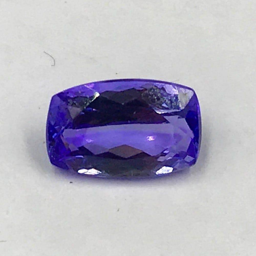 1.65ct Faceted Tanzanite Cushion Cut Gemstones: Faceted Tanzanite Cushion Tanzanite gems are believed to represent heart and intellect combined with intuition and purity. These stones are used as symbols of dignity, truth, judgement and longevity.