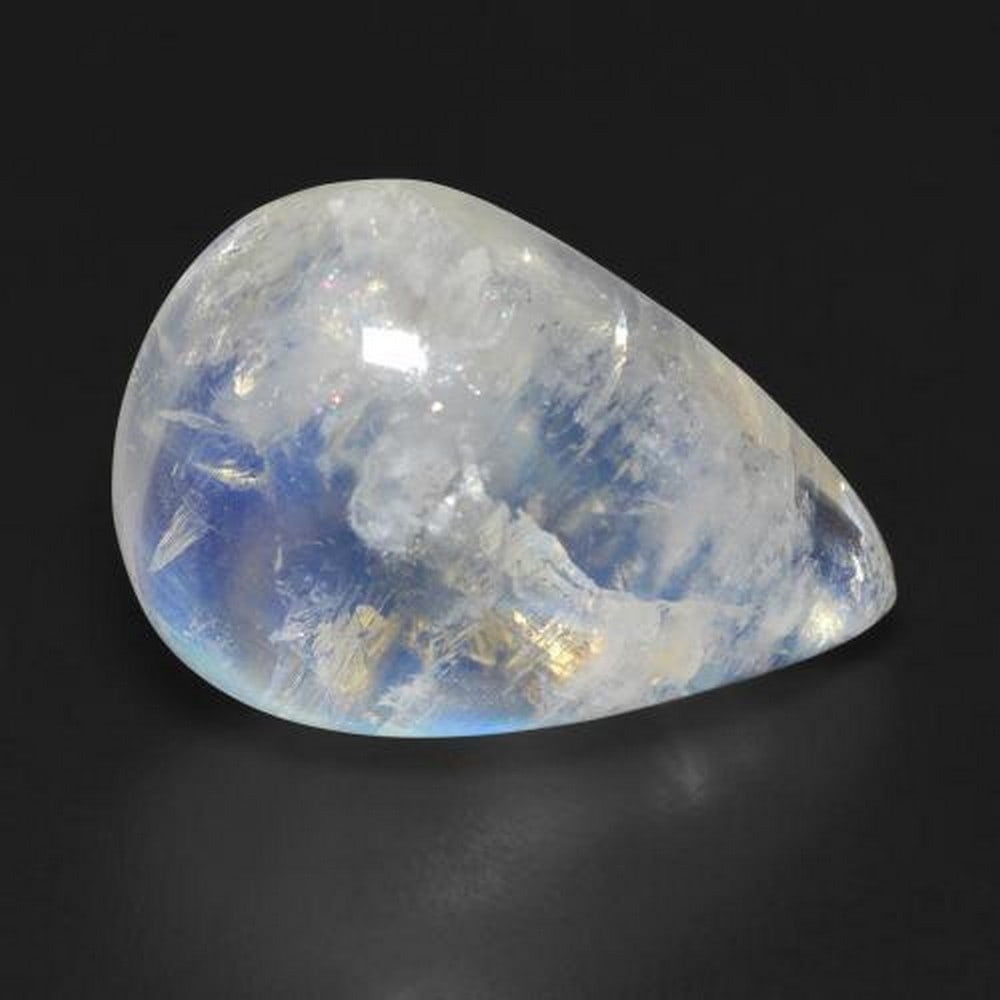 12.48ct Pear Bluish White Rainbow American Moonstone: 12.48ct Pear Bluish White Rainbow American Moonstone Size: 19.3 x 13.25 x 7.15 mm Shape: Pear Cabochon Clarity: Transparent Untreated Origin: United States Mohs Hardness: 6-6.5 View Photos For F