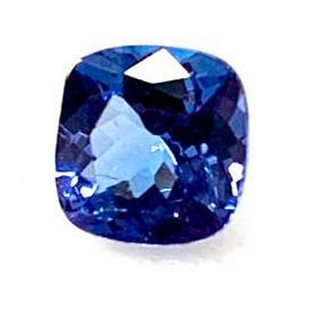 0.86ct Cushion Faceted Tanzanite Gemstone: Tanzanite is a rare and precious gemstone, which has been coined a 'geographical phenomenon' because of the unusual formation of the stone. The only known source this stone can be found in is