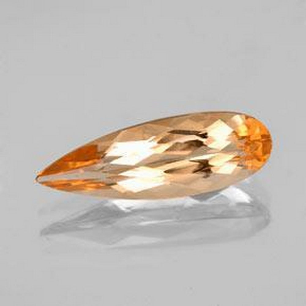 2ct Marquise Cut Imperial Topaz: 2ct Marquise Cut Imperial Topaz Raw Dimension: 16 x 5 x 4mm Total Carat Weight: 2.90ct Treat: No Please view photos for further details.