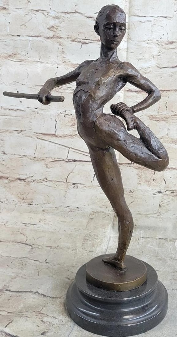 Ballerina Dancer Girl Original Bronze Statue - 14" x 8.5": Ballerina Dancer Girl Original Bronze Statue - 14" x 8.5" This modern sculpture captures elegance and grace, depicting a tall, slender woman in a captivating pose. Balancing on one leg with