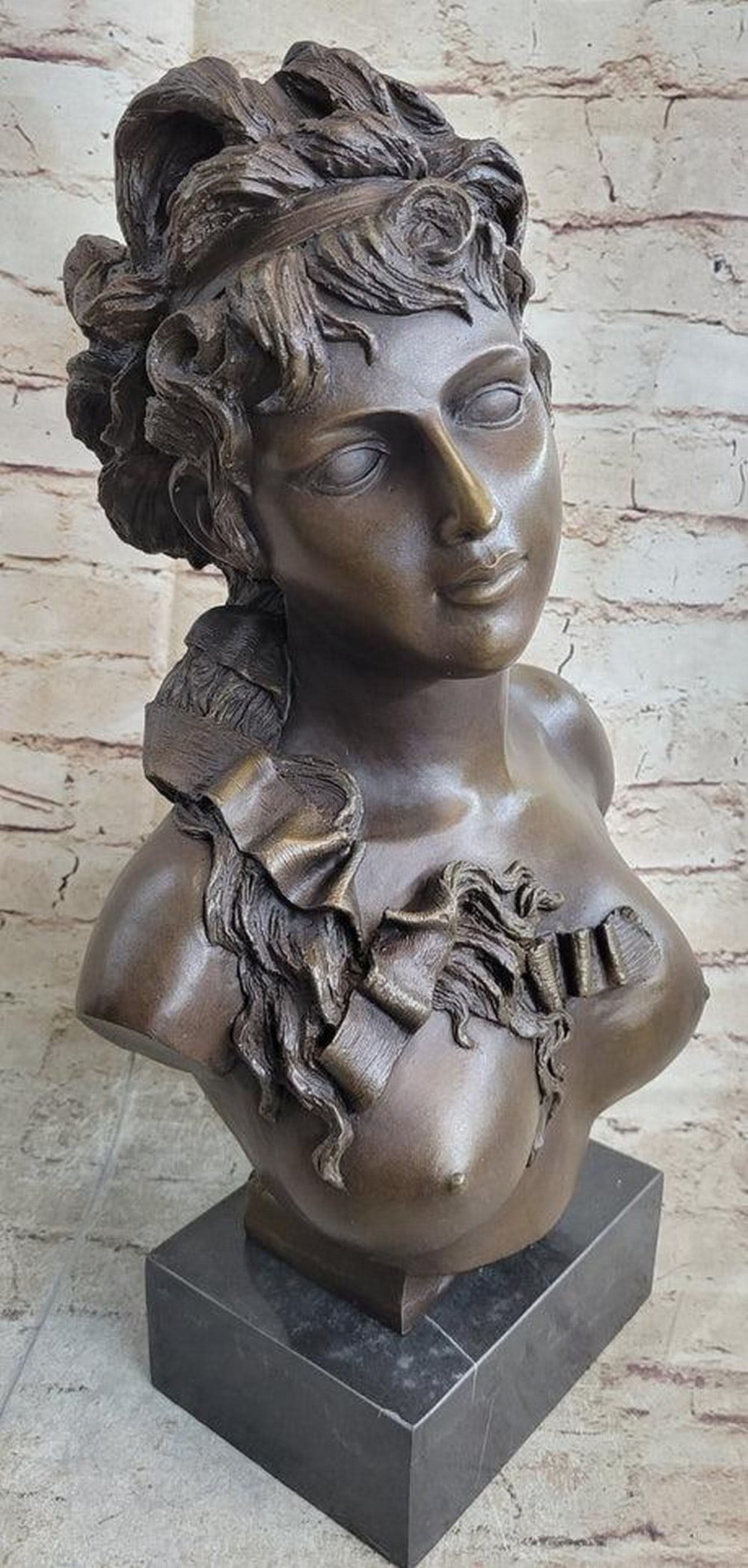 Flower Girl Bust Bronze Statue: Flower Girl Bust Bronze Statue This is a captivating 100% bronze bust of a beautiful maiden. This absolutely exquisite beauty was molded by using an age-old method of sculpting called lost-wax castin