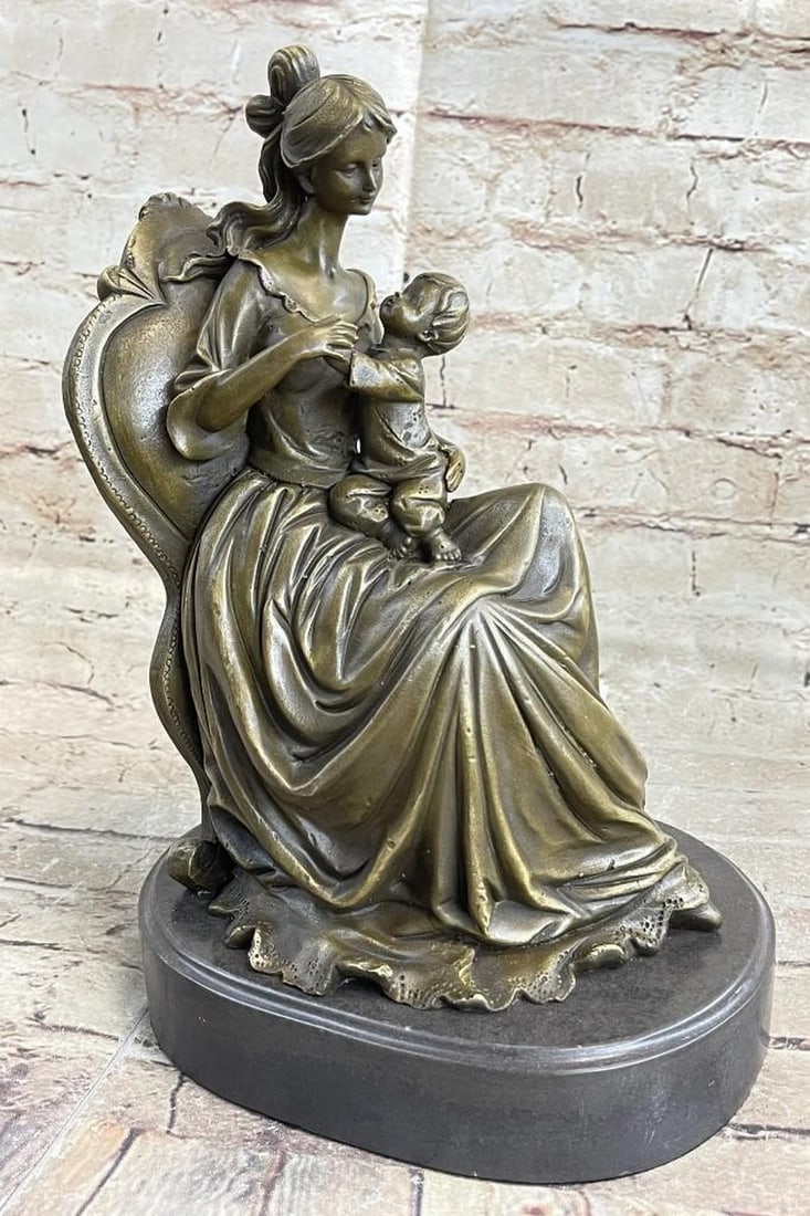 Mother & Baby Bronze Sculpture: Mother & Baby Bronze Sculpture A beautiful Victorian woman rests on a chair with her young child. The joyful baby is her lap close to her. She is attentive to her son in a way a great mother is.