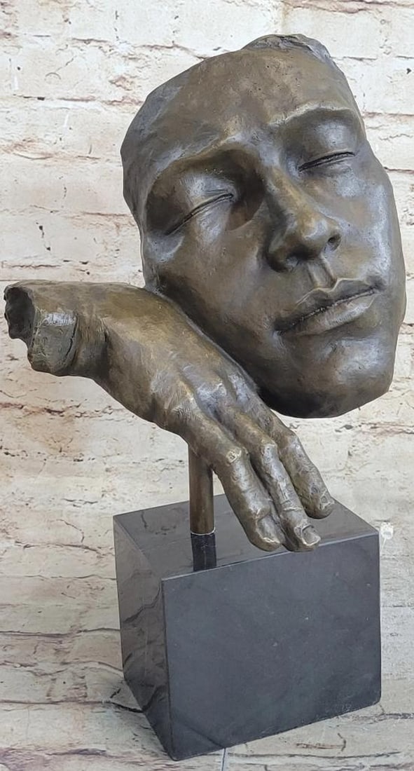 Abstract Surrealistic Modern Art Resting Man Bronze Bust Sculpture - 18" x 12": Abstract Surrealistic Modern Art Resting Man Bronze Bust Sculpture - 18" x 12" This amazing piece of art inspired by Salvador Dali, will leave you stoned. The man rests on his hand, while he
