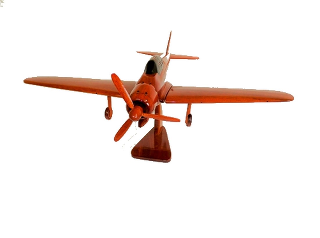 1940-45 Mitsubishi A6M ZERO Wooden Model: 1940-45 Mitsubishi A6M ZERO Wooden Model The Mitsubishi A6M “Zero,” a long-range combat aircraft produced by Mitsubishi Heavy Industries, served the Imperial Japanese Navy from 1940 to