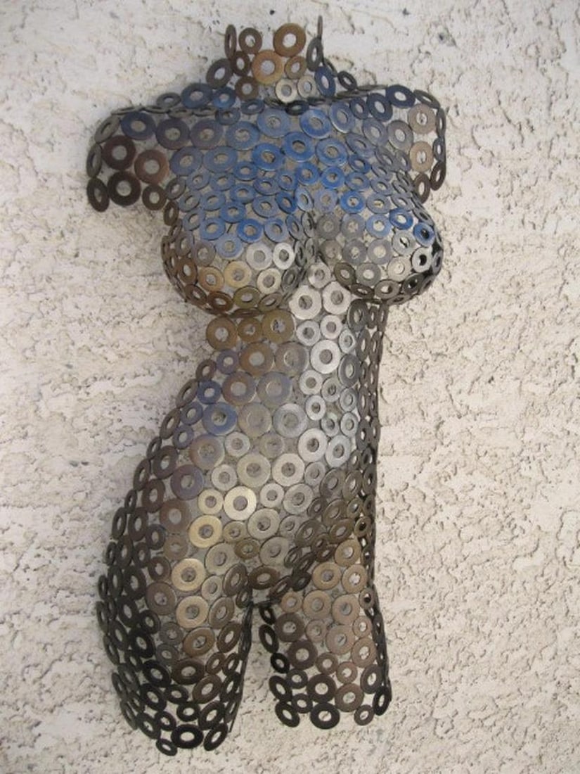 Rachel III Metal Torso Sculpture: Rachel III Metal Torso Sculpture This stunning female torso sculpture seamlessly blends sculpture and painting, offering a timeless addition to any collection. Hand-formed and welded, its textured de