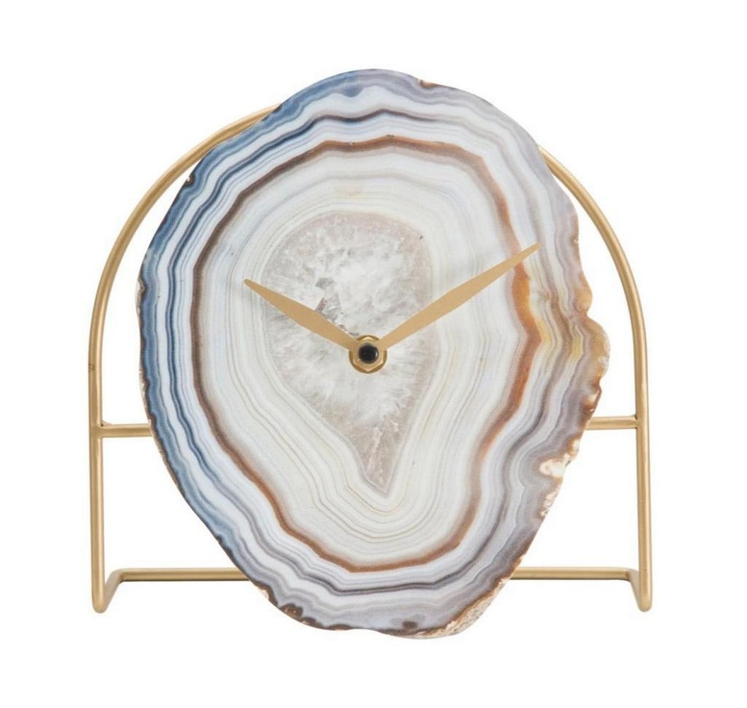 Marble Table Clock with Golden Accents: Marble Table Clock with Golden Accents A gilded metal table clock featuring a dial inspired by geodes, embodying a perfect blend of design and elegance Dimensions: Height: 19.5 cm / 7.7" Width: