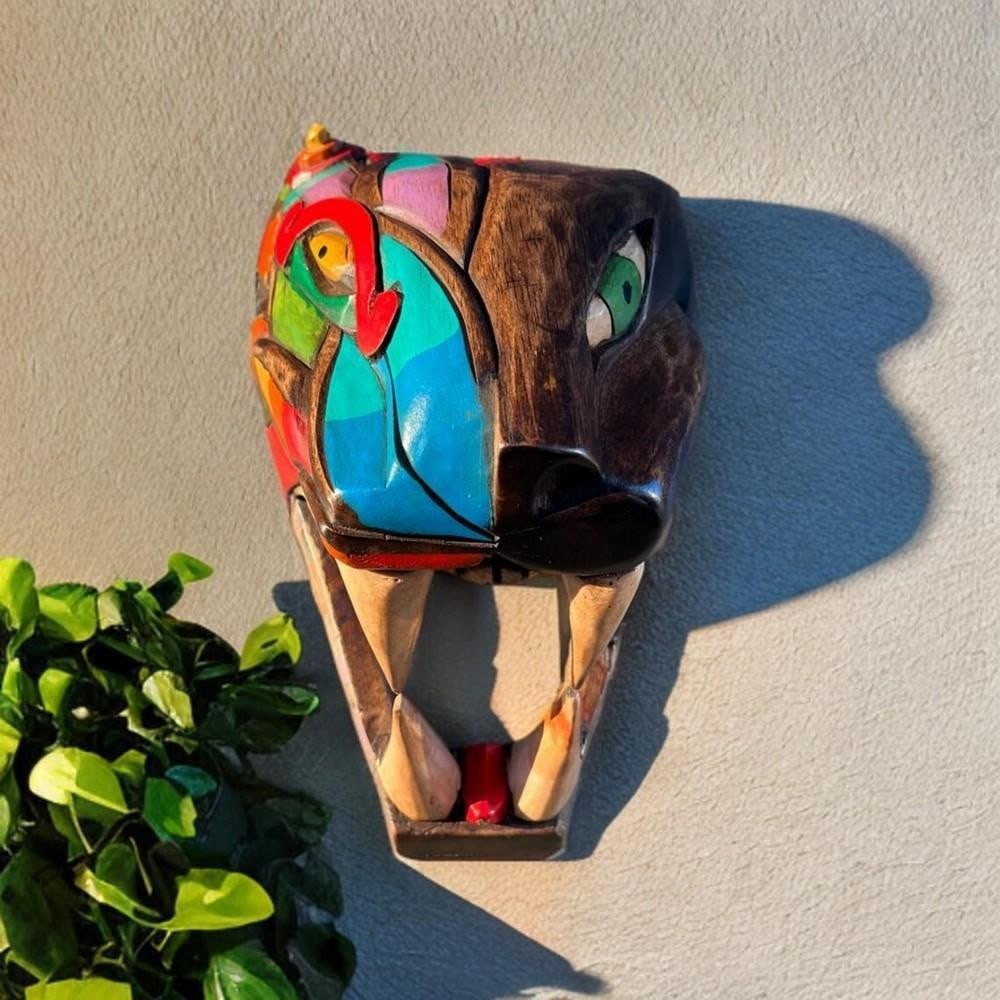 Balam-Kan Dual Deity Hand-Carved Wood Wall Art: Balam-Kan Dual Deity Hand-Carved Wood Wall Art This remarkable hand-carved cedar wood piece showcases Balam-Kan, a fusion of two powerful Mayan deities—the feathered serpent, god of winds, fire, and