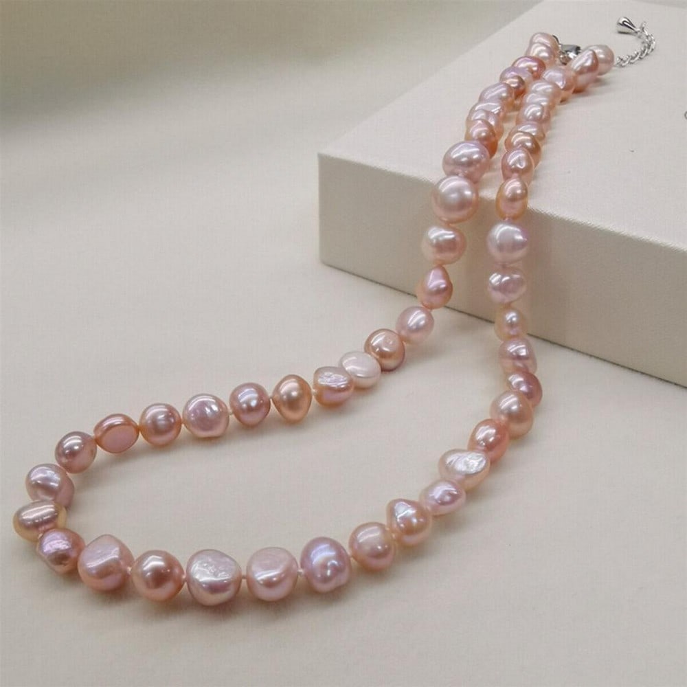 18" Genuine Natural Purple Freshwater Baroque Pearl Necklace 8-9mm: 18" Genuine Natural Purple Freshwater Baroque Pearl Necklace 8-9mm Embrace elegance with this 18-inch Genuine Natural Purple Freshwater Baroque Pearl Necklace. Featuring lustrous 8-9mm baroque pea