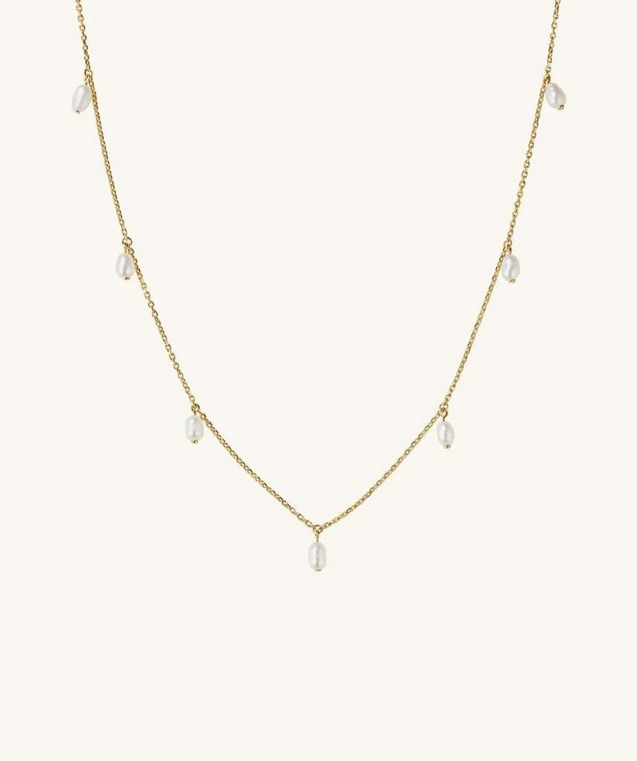 Dainty Floating Pearl Necklace: Dainty Floating Pearl Necklace This dainty floating pearl necklace is a timeless and elegant piece designed to complement any outfit with its delicate beauty. Measuring 16-18 inches in length, it off