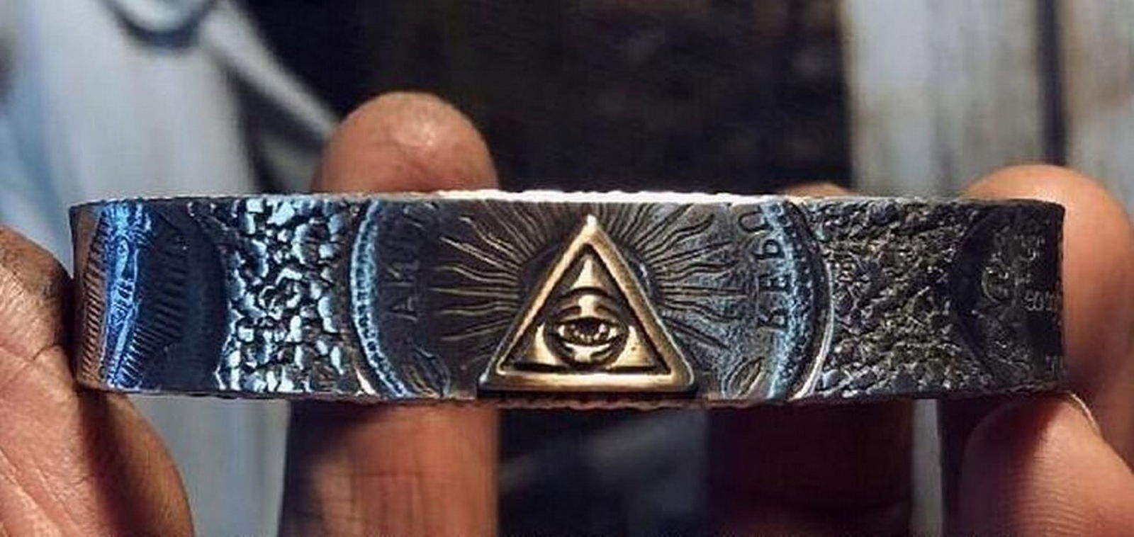 God's Eye Adjustable Bangle: God's Eye Adjustable Bangle A symbol of protection and spiritual insight, the God's Eye Bangle is handcrafted by Mongolian artisans using traditional techniques. Featuring an intricately