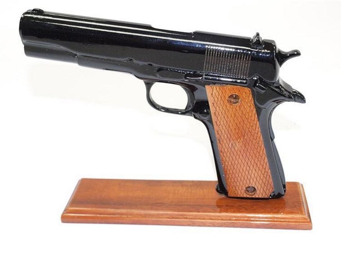 45 Caliber Black Handgun Wooden Replica: 45 Caliber Black Handgun Wooden Replica Introducing our Wooden 45 Caliber Handgun, a stunning addition to any collection or display. Crafted with precision and attention to detail, this replica